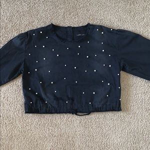 Black long sleeve top with pearl details